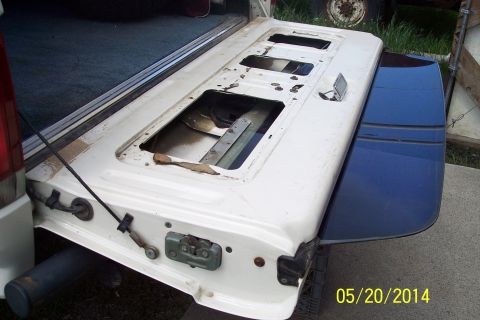 1990 Ford Bronco - Removed tailgate from a 1990 Ford Bronco, ready for repair or replacement.