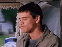 2000 Mercury Grand Marquis - Interior shot of a man inside a vehicle with his eyes closed.