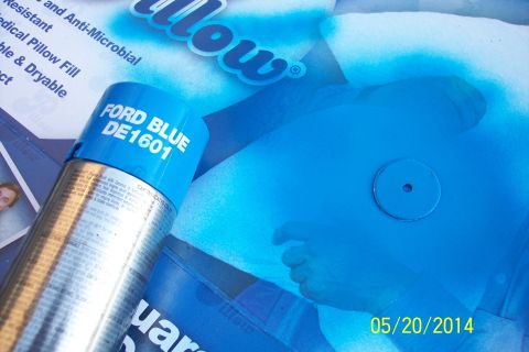 1990 Ford Bronco - A spray can labeled Ford Blue DE1601 is shown against a blue background, possibly indicating a paint color.