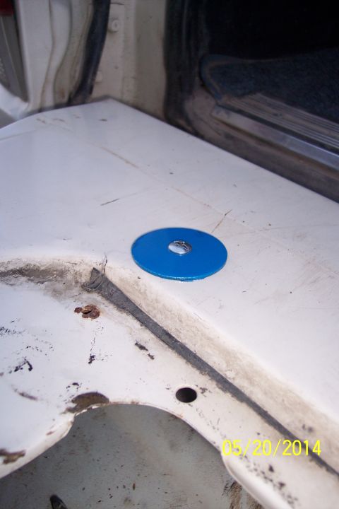 1990 Ford Bronco - A blue washer is visible on a white surface, with a date stamp of 05/20/2014.