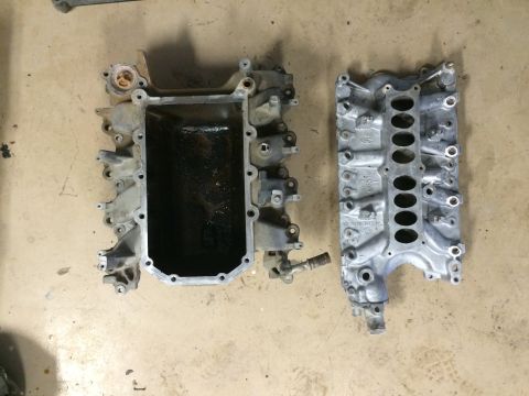 1996 Ford Bronco - comparison of Lightning lower manifold (left) and 351W manifold. There was really no way to merge the two together.