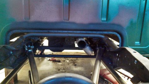 1967 Ford F-250 - Custom exhaust pipe installation on a truck frame.