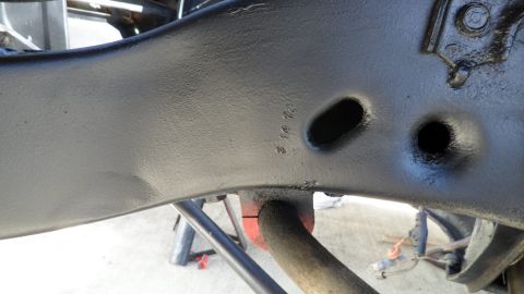 1972 Ford Ranchero - A close-up view of a vehicle's frame shows stamped markings, but no clear identification.