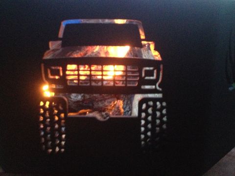1978 Ford Bronco - This metal art piece resembles a truck's front end with a glowing interior.