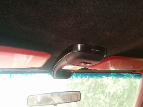 1988 Ford Bronco - Interior view of a 1988 Ford Bronco, showing the overhead console and rearview mirror.