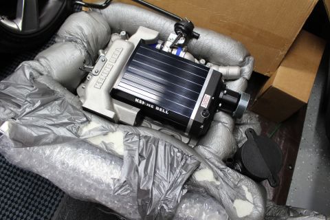 2003 Ford Crown Victoria - Kenne Bell supercharger with a black finned lid mounted on a cast aluminum intake manifold rests in protective foam inside a box.