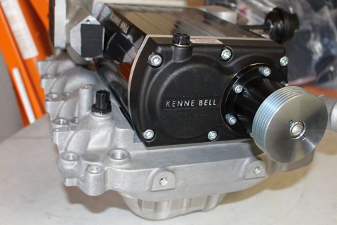 2003 Ford Crown Victoria - Side view of a black Kenne Bell supercharger with its ribbed drive pulley bolted to a cast aluminum intake manifold.