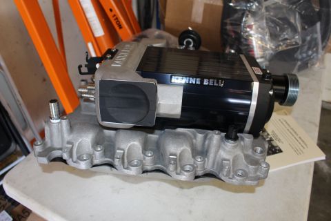 2003 Ford Crown Victoria - Kenne Bell supercharger with its round throttle opening and drive pulley bolted onto a cast aluminum intake manifold.