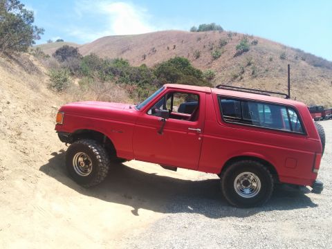 1988 Ford Bronco - This red Ford Bronco appears to be from the 1987 model year, not 1988 as claimed.
