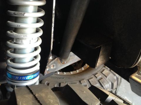 1985 Jeep CJ7 - Close-up view of a King Shocks suspension component and a large off-road tire.