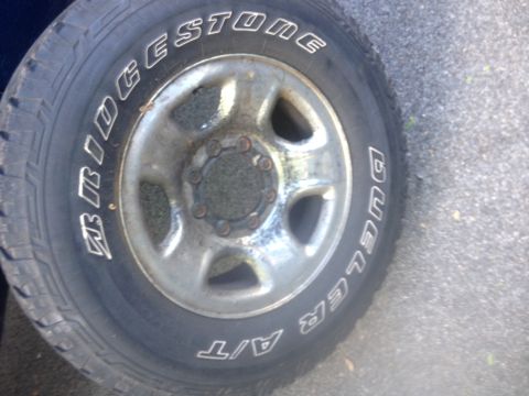 1978 Ford Bronco - This photo shows a close-up of a tire and wheel assembly, not a specific vehicle model or year.