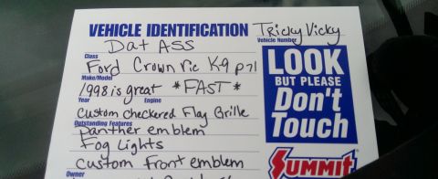 2000 Mercury Grand Marquis - A handwritten vehicle identification card details custom features and year information for a Ford Crown Victoria.