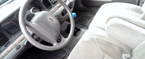 2000 Mercury Grand Marquis - Interior of a 2000 Mercury Grand Marquis, the dashboard and front seating area.
