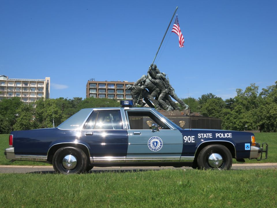 State Police Ford sedan with push bar parked near the Iwo Jima Memorial