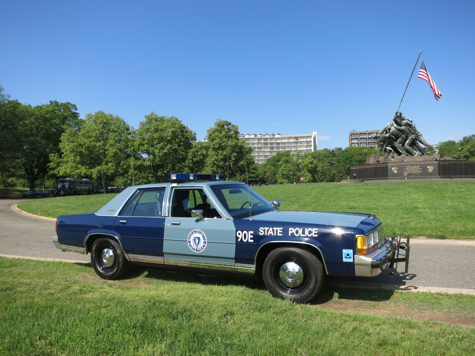 Massachusetts State Police Ford sedan with push bar parked near the Iwo Jima Memorial