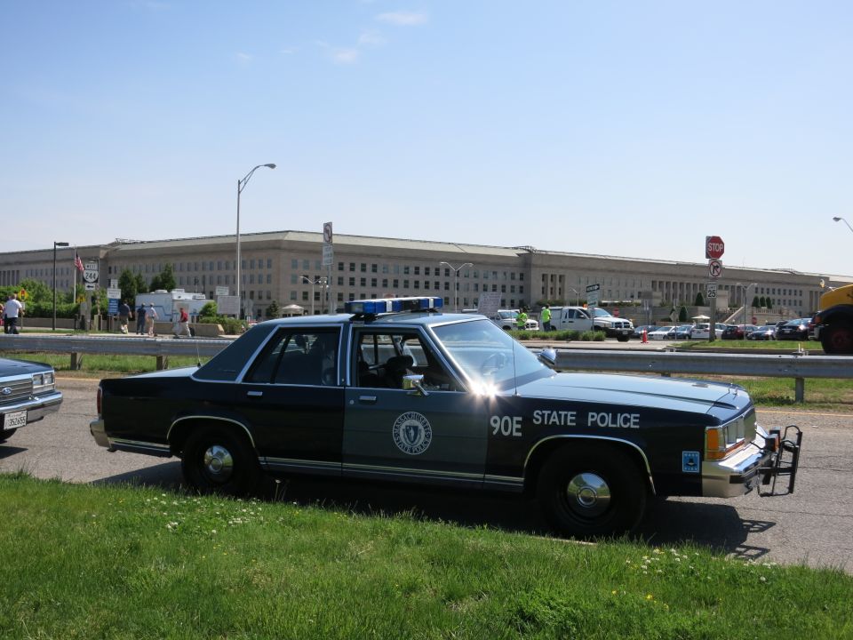 State Police Ford sedan 90E with push bar parked near the Pentagon