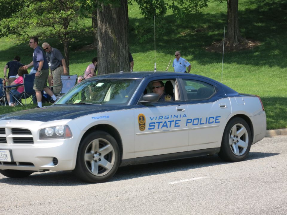Silver Dodge Charger marked Virginia State Police Trooper on a road