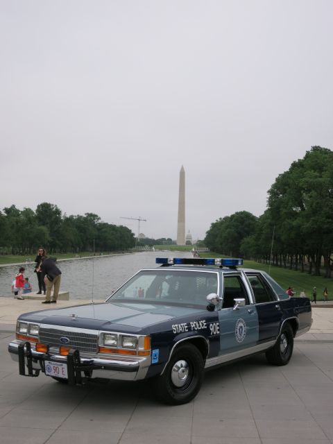 1991 Ford LTD Crown Victoria - navy and silver "State Police 90E" Ford cruiser parked beside the long Reflecting Pool leading to the Washington Monument.