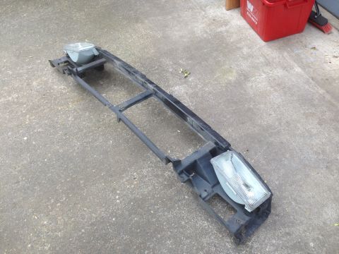 1992 Ford F-150 - This is a vehicle's front headlight assembly, likely removed for repair or replacement.