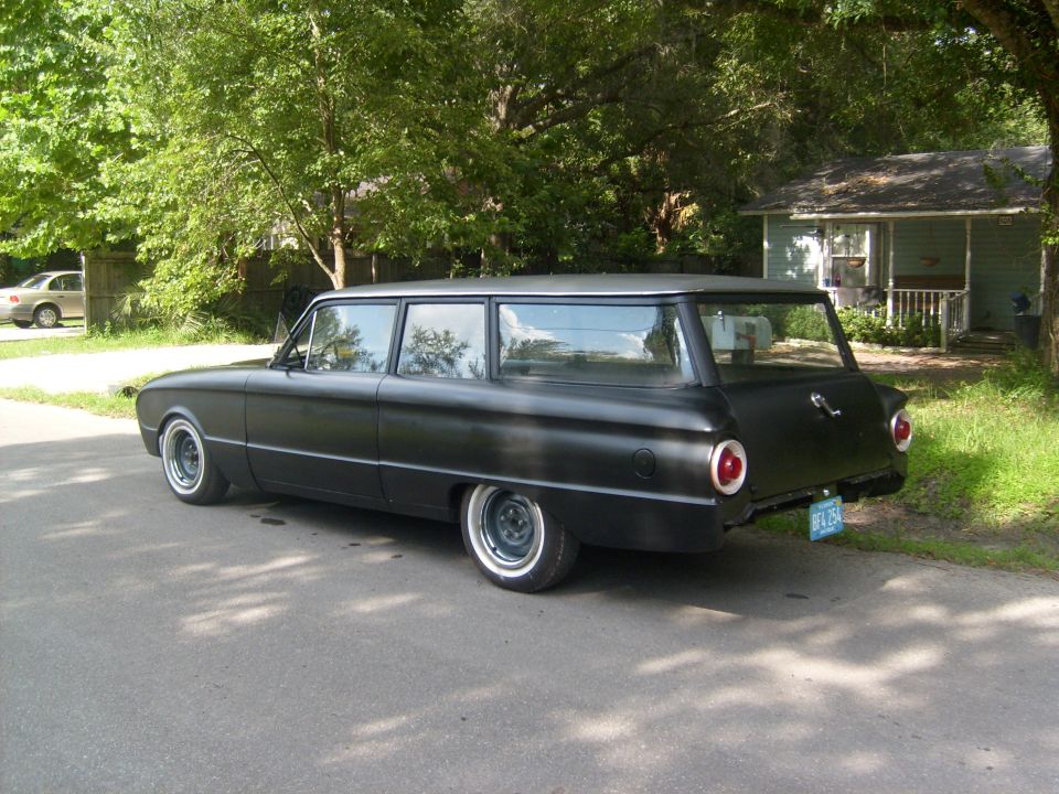1962 Ford Falcon wagon, matte black paint, whitewall tires, parked on asphalt