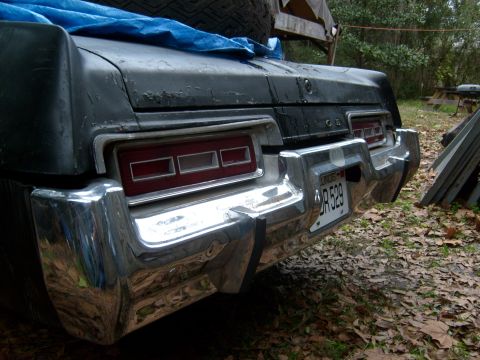 1974 Dodge Monaco - Rear view of a 1974 Dodge Monaco, showing its distinctive chrome bumper and taillight design.