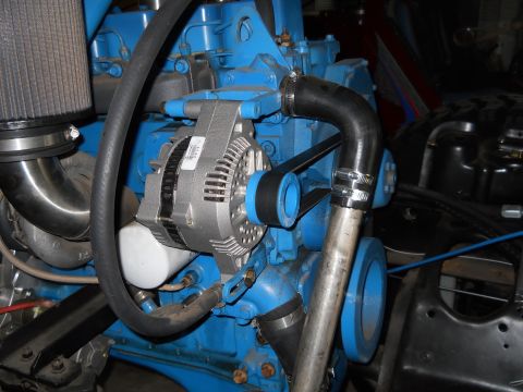 1992 Ford Bronco - The alternator is a key component in an engine's electrical system, driven by a belt.
