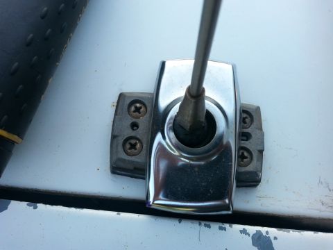 1992 Ford Bronco - then pop the cover off the antenna mount and remove the 4 screws, pull the antenna up and unplug the cable. It may take a bit of effort.