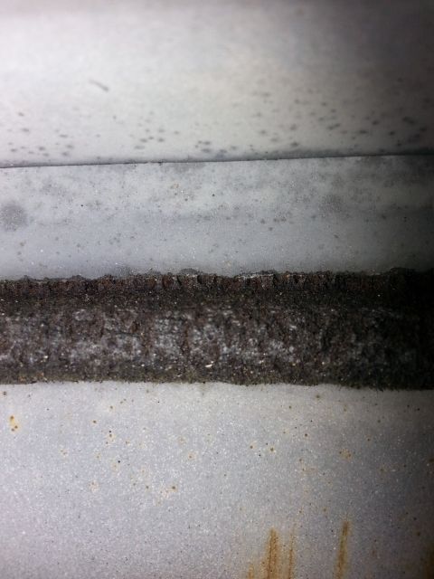 1992 Ford Bronco - over the years, I'm sure it has started to deteriorate. I'm going to cover the entire area with a load of seam sealer.