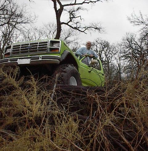 1986 Ford Bronco - Parked on the log pile.