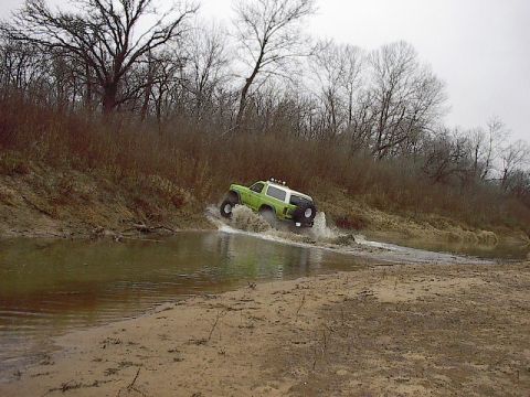 1986 Ford Bronco - Crossing a creek, couldn't get over the soft sand bank on back side.