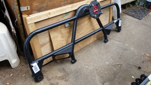 1988 Ford Bronco - Aftermarket rear bumper with integrated spare tire carrier, likely for an SUV or truck.