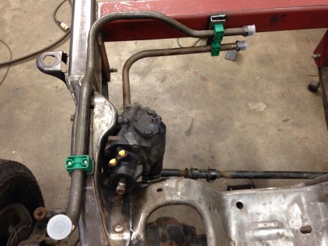 1993 Ford Bronco - Close-up view of steering gear and frame components, likely during a vehicle repair or restoration.