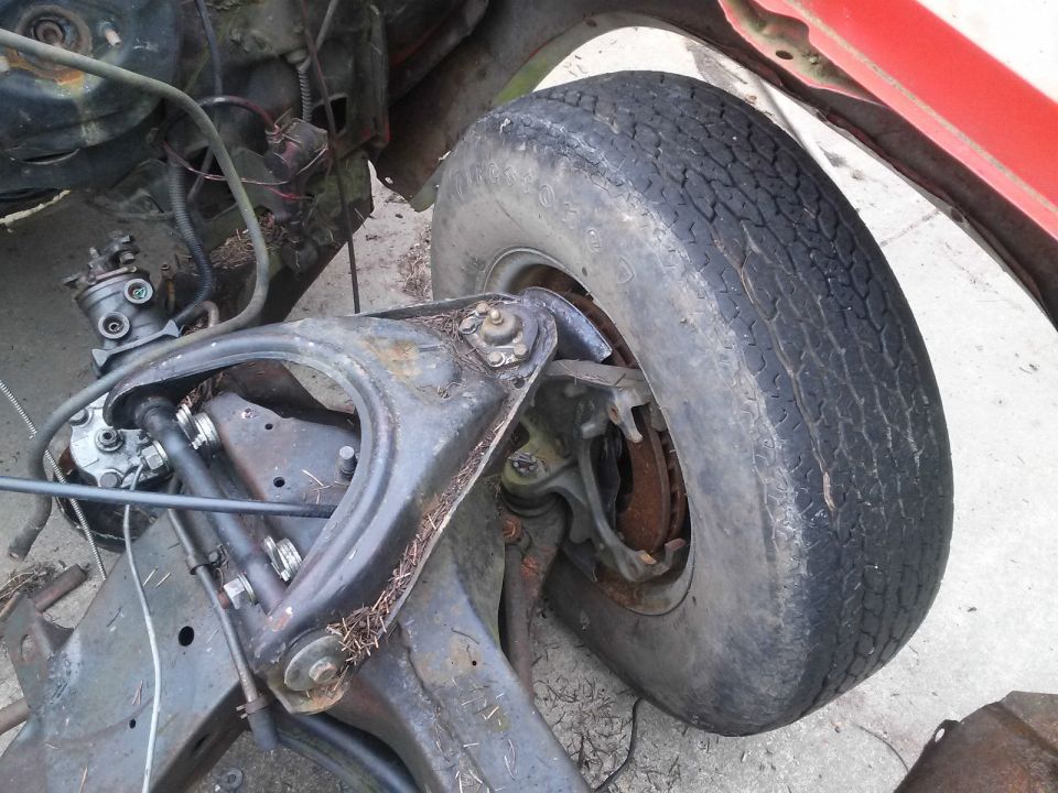 Front suspension components and tire from an old car