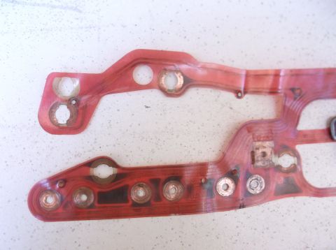 1979 Ford Ranchero - This is a circuit board, not a complete vehicle part, showing copper contacts and red plastic.