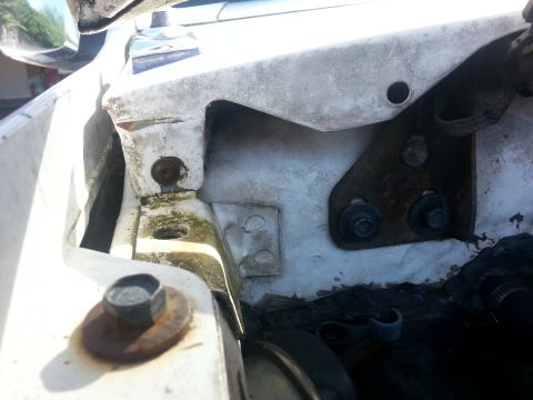 1992 Ford Bronco - now under the hood. on mine at least, there are 4 additional screws there are two at opposite ends and two in the middle that hold the A/C…