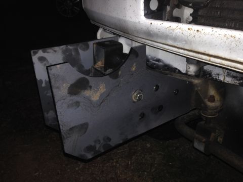 1990 Mitsubishi Montero - A custom-fabricated metal bracket is attached to the vehicle's frame, likely for accessory mounting.