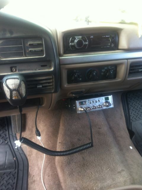 1994 Ford Bronco - Interior view of a 1994 Ford Bronco, a CB radio and microphone mounted on the dashboard.