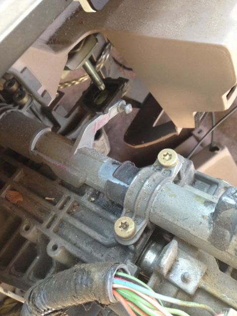 1994 Ford Bronco - Close-up view of the steering column assembly, showing mechanical components and wiring harnesses.