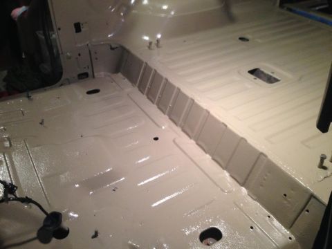 1994 Ford Bronco - Vehicle interior floor after painting, showing clean surfaces and preparation for reassembly.
