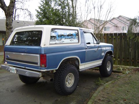 1989 Ford Bronco - This blue and white Ford Bronco appears to be from the early 1980s, not a 1989 model.