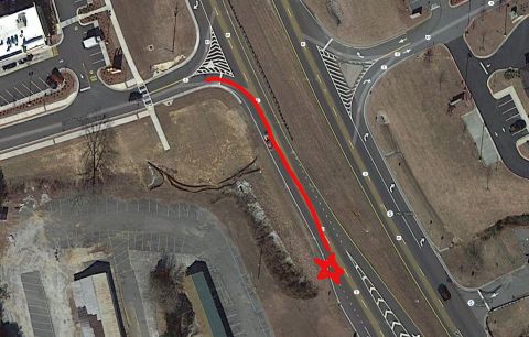 1979 Ford F-150 - This is an aerial view of a road intersection with a red arrow showing a path.