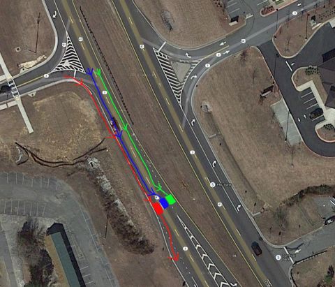 1979 Ford F-150 - An aerial perspective shows a complex road intersection with traffic flow lines and multiple vehicles.