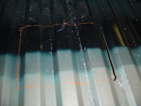1996 Ford Bronco - A truck bed shows orange markings and a cut-out hole, indicating a modification or repair area.