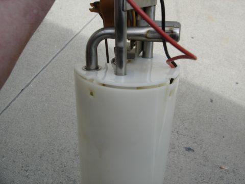 1996 Ford Bronco - A fuel pump assembly is shown with its various components and connections.
