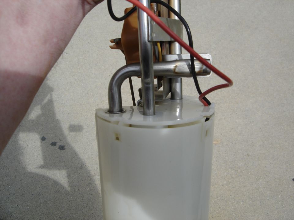 Fuel pump assembly with metal lines and electrical wires