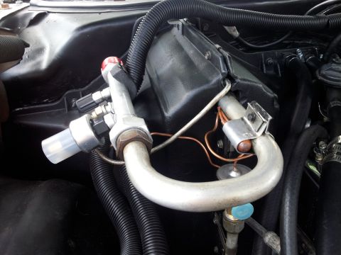 1976 Ford Ranchero - Automotive AC system expansion valve and refrigerant lines shown in detail.