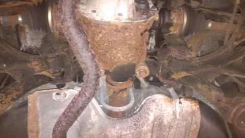 1994 Ford Thunderbird - Undercarriage components showing significant rust and corrosion.