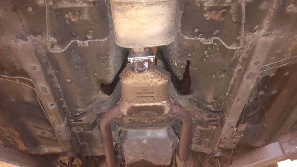 Underbody view of vehicle exhaust system and catalytic converter