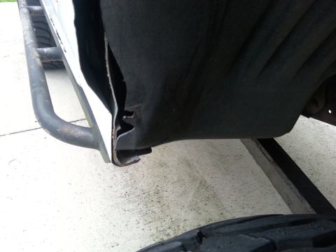 1992 Ford Bronco - Modified inner fender well and rock slider detail.
