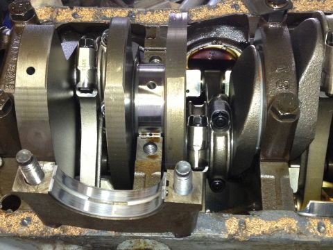 1961 International Scout 800 - Close-up view of an engine's internal components, including the crankshaft and connecting rods.